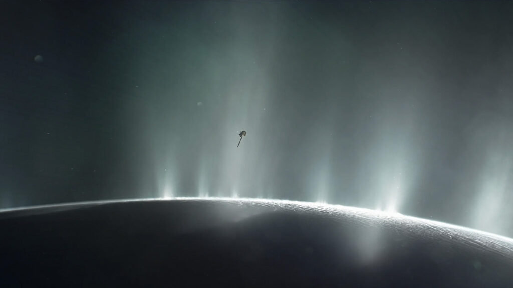 Image shows dramatic plumes spraying water ice and vapor from many locations along the famed 'tiger stripes' near the south pole of saturn's moon= enceladus class=